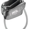 Lightweight gray aluminum Petzl Verso belay device with V-shaped friction grooves and an attached steel cable loop.