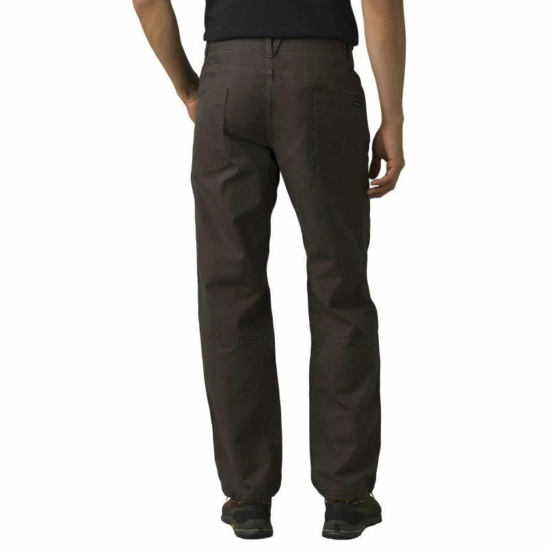 Back view of dark brown Prana Kragg climbing pants in organic cotton stretch fabric with reinforced knee panels.